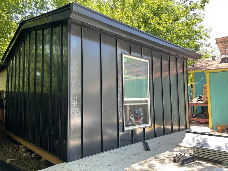 Black standing seam metal wall panels for Roof Inspection in Palmdale